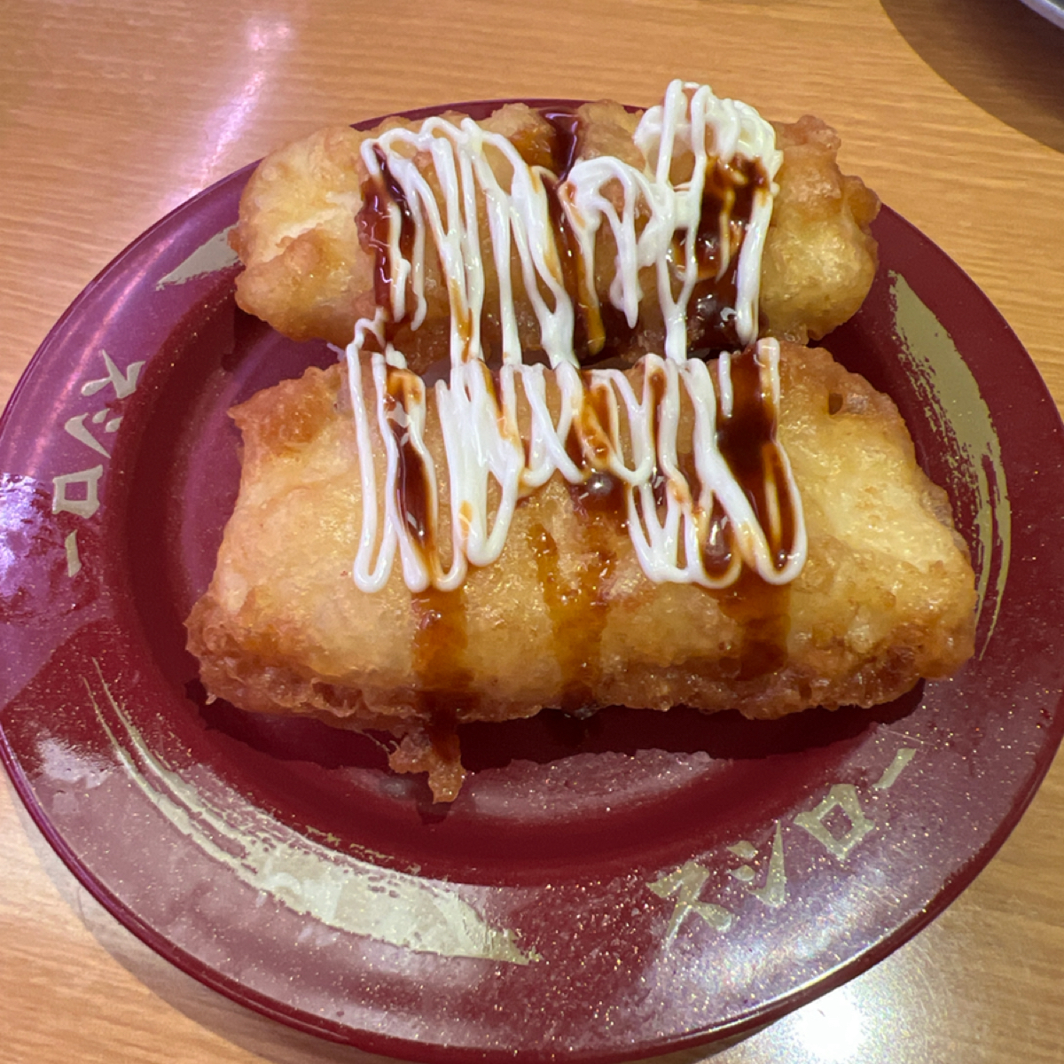 スシロー壽司郎 台北中華路店 的餐點圖片：蒜香花枝天婦羅 由Sheng 拍攝
