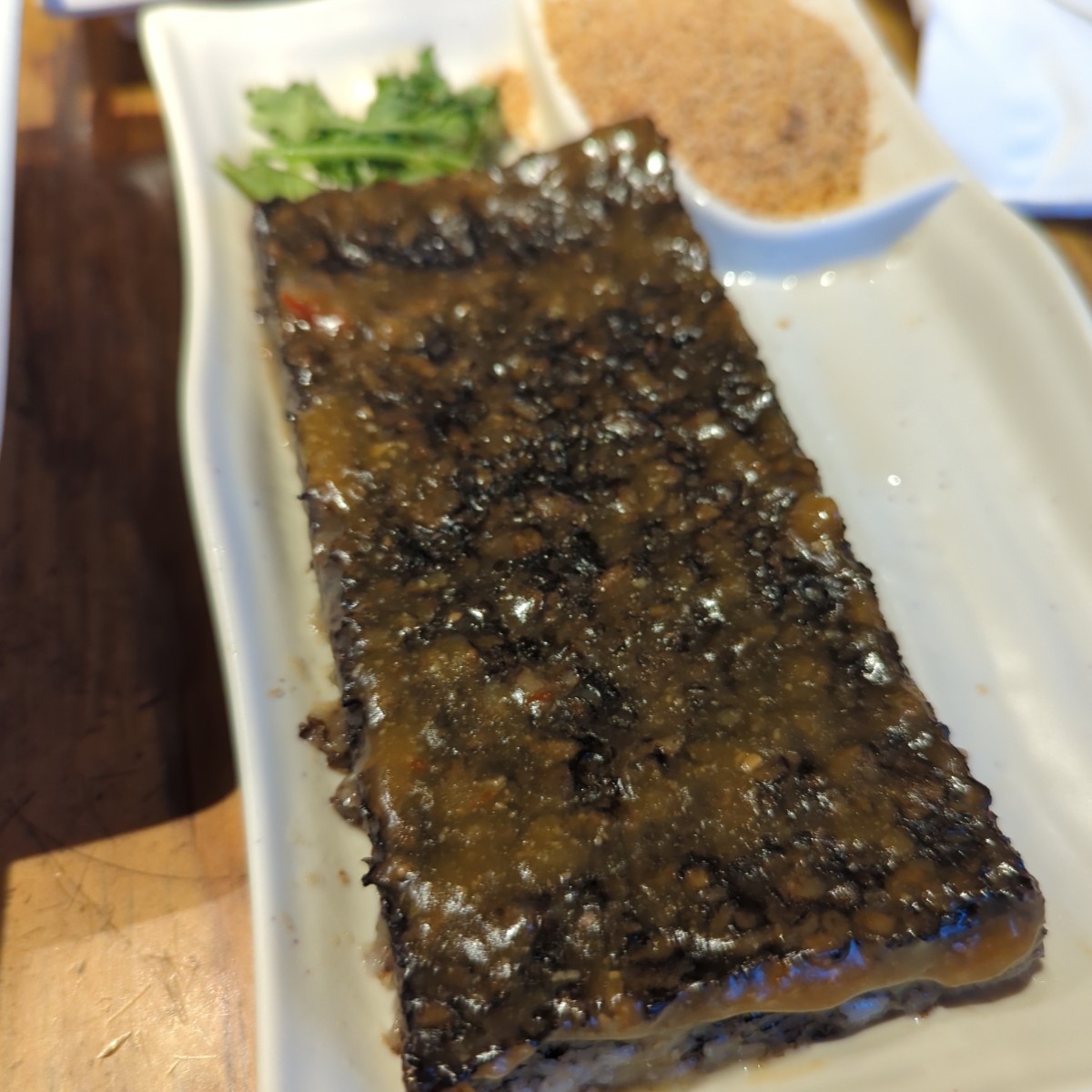 Meal image of 阿城鵝肉 土城總店: 🍡 米血糕 (小) $50
米血糕Q彈有嚼勁，搭配花生粉真的是絕配。作為配菜，口感豐富，價位合理 shot by 美食玩很大