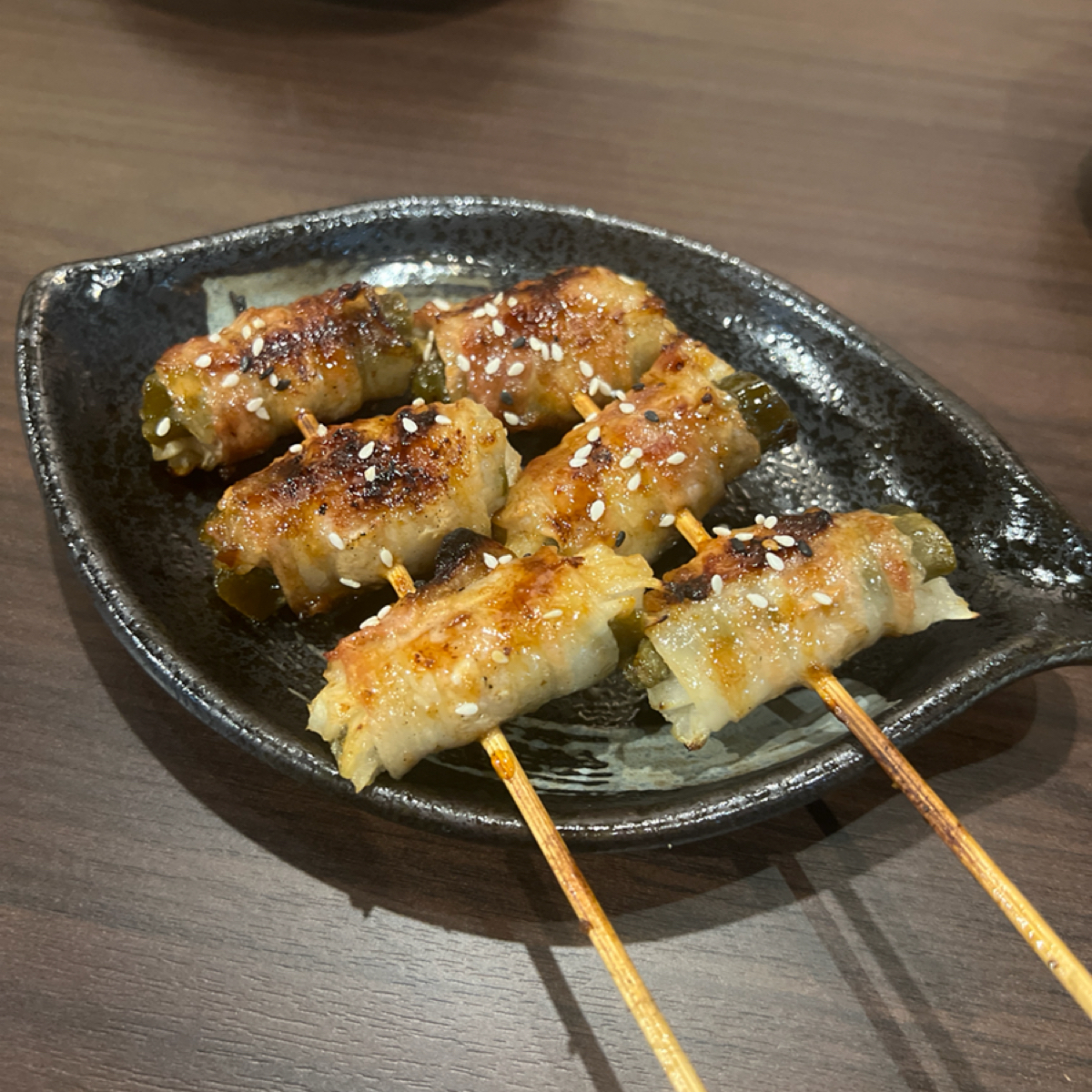 Meal image of 炙火居酒屋: 剝皮辣椒豬肉捲二串$140 shot by 七咪