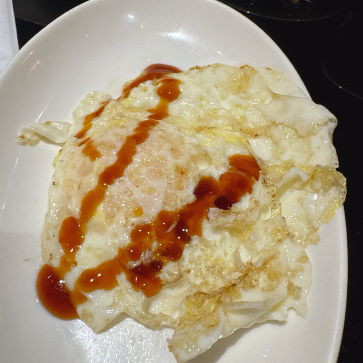 皇辰鐵板燒 的餐點圖片：荷包蛋 由跟著小胖吃胖胖 拍攝