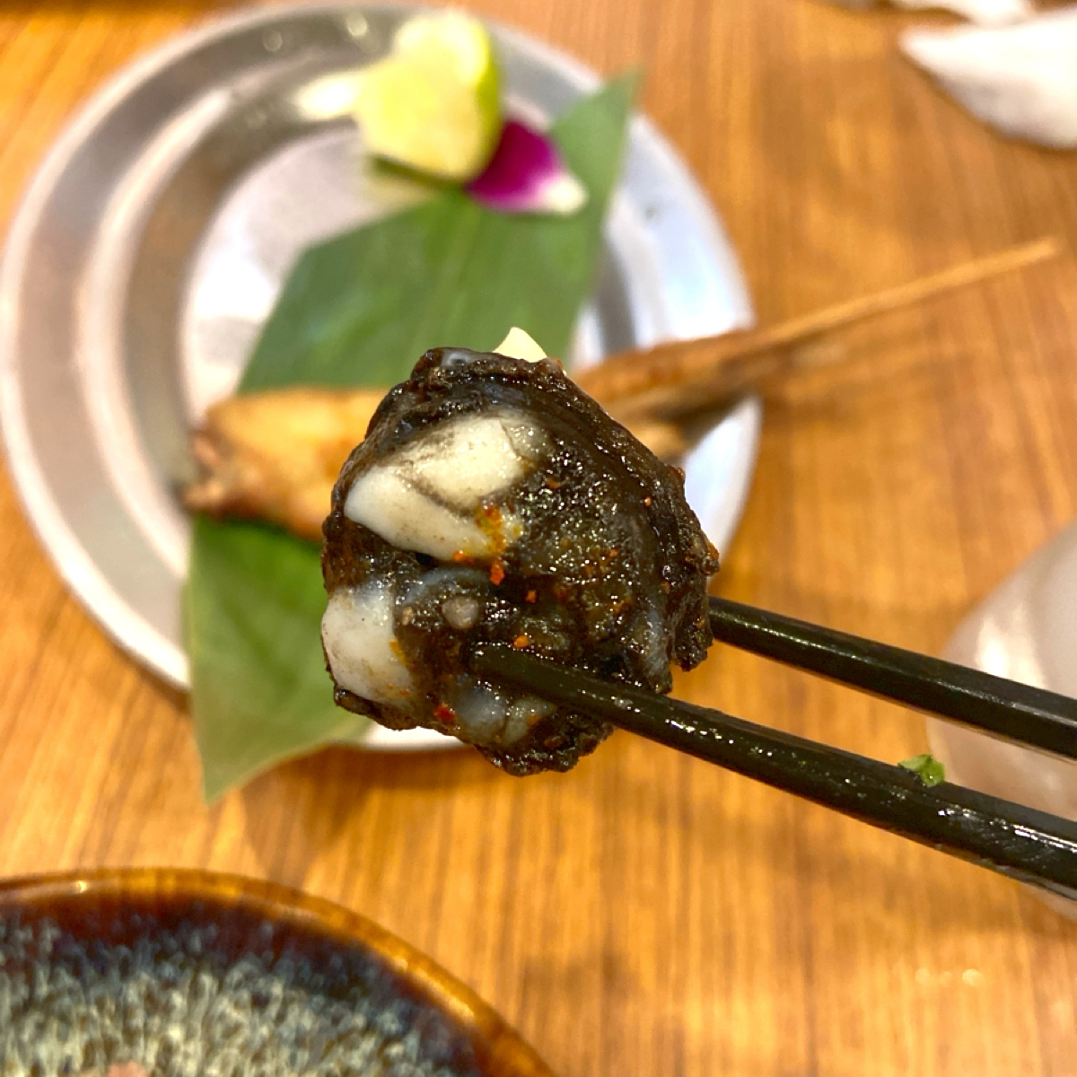 Meal image of 笑居樂食居酒屋小料理: 墨魚香腸近照。 shot by 每個人都在找他的貓