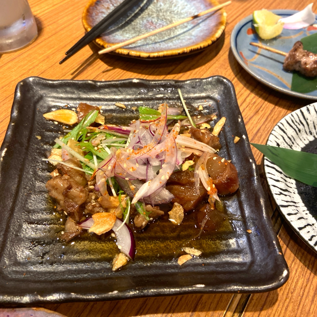Meal image of 笑居樂食居酒屋小料理: 蒜香燉煮牛筋 $189
這道是我個人心中第一☝️
牛筋切小塊很好入口，且燉到軟爛放到嘴裡就化開，吃起 shot by 每個人都在找他的貓
