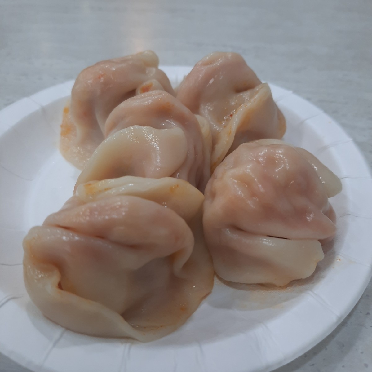 Meal image of 八方雲集 台北聯合店: 韓式辣味水餃 5顆 ＄35
微辣，辣度不會到不能接受，搭配玉米濃湯可以同時享受到鹹甜辣三種味道。 shot by emo小孩