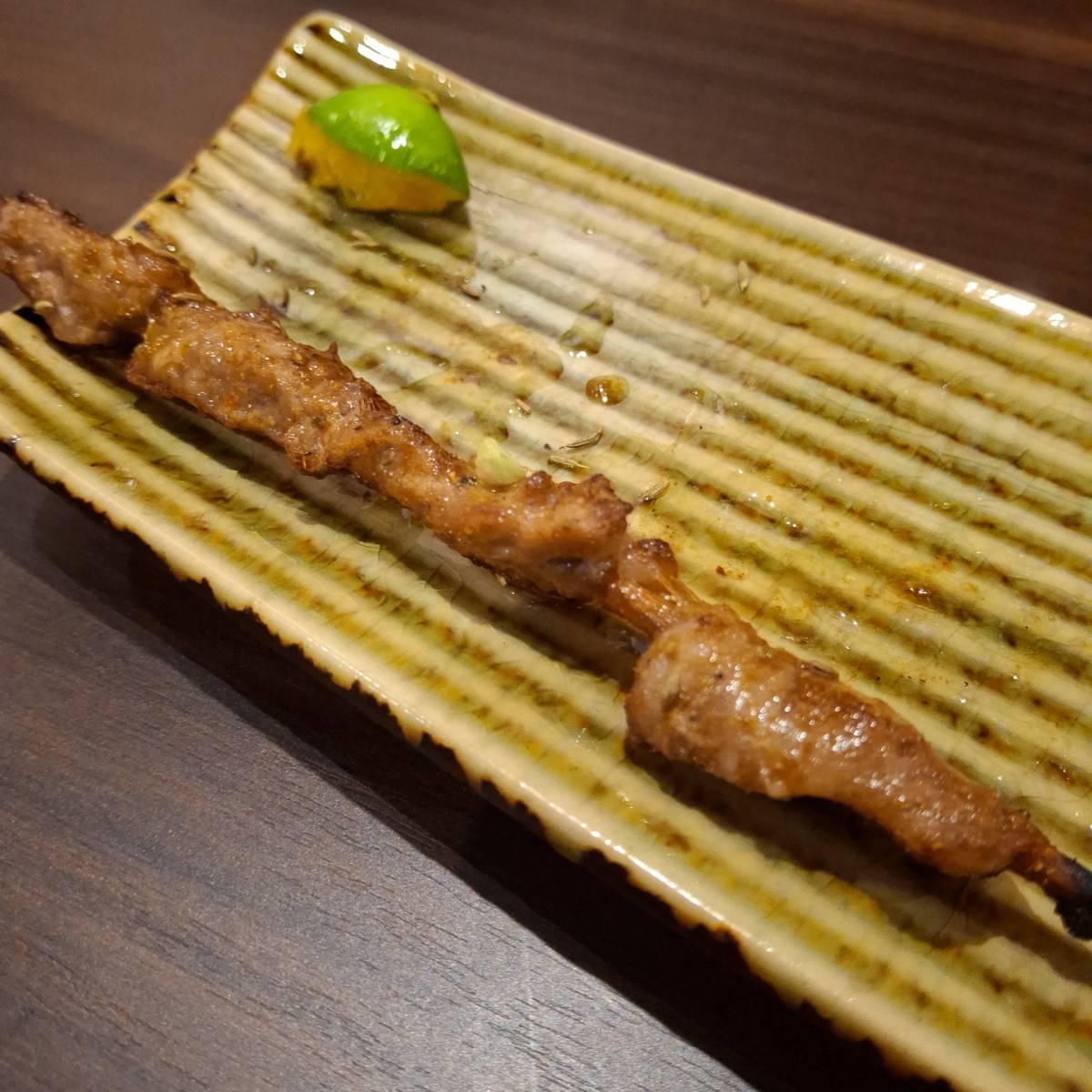 Meal image of 炙火居酒屋: 羊肉串，本來有兩支，但其中一支在肚子裡了w shot by 美食肥之豬