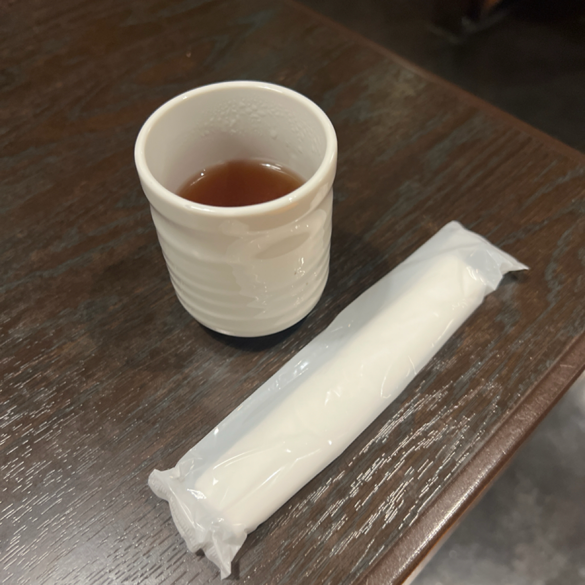 Vibe image of 鍋ぞう 池袋サンシャイン６０通り店: 飯後會上紙巾跟熱茶 shot by 七咪